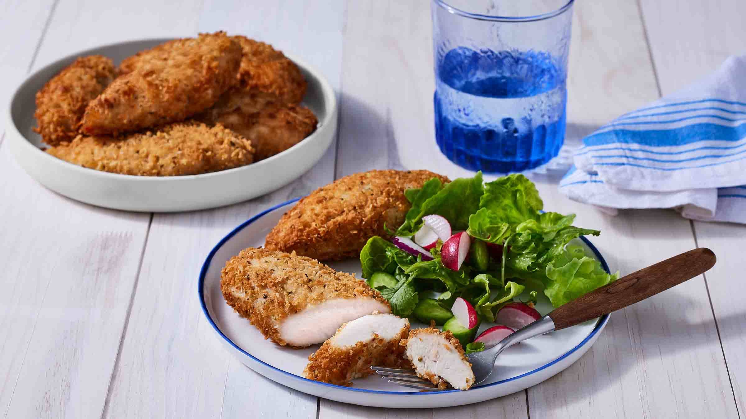 The Extra Ingredient For Breaded Chicken That's Both Crispy And Moist