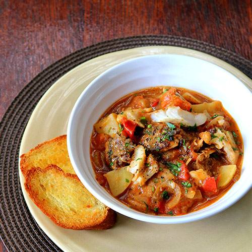 Spicy Hake Stew with Garlic Toasts