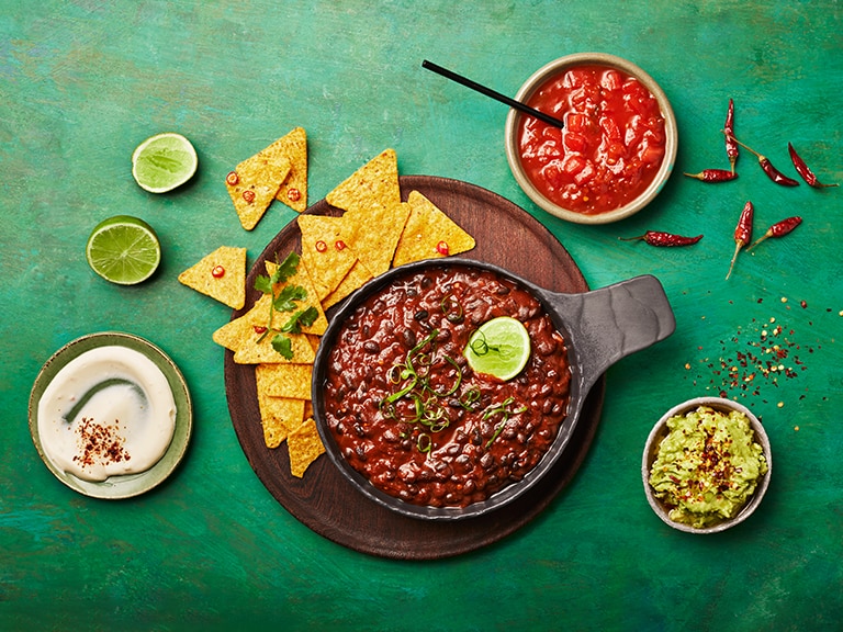 Taco Bowl with Spicy Beans, Salsa, Avocado and Sour Cream
