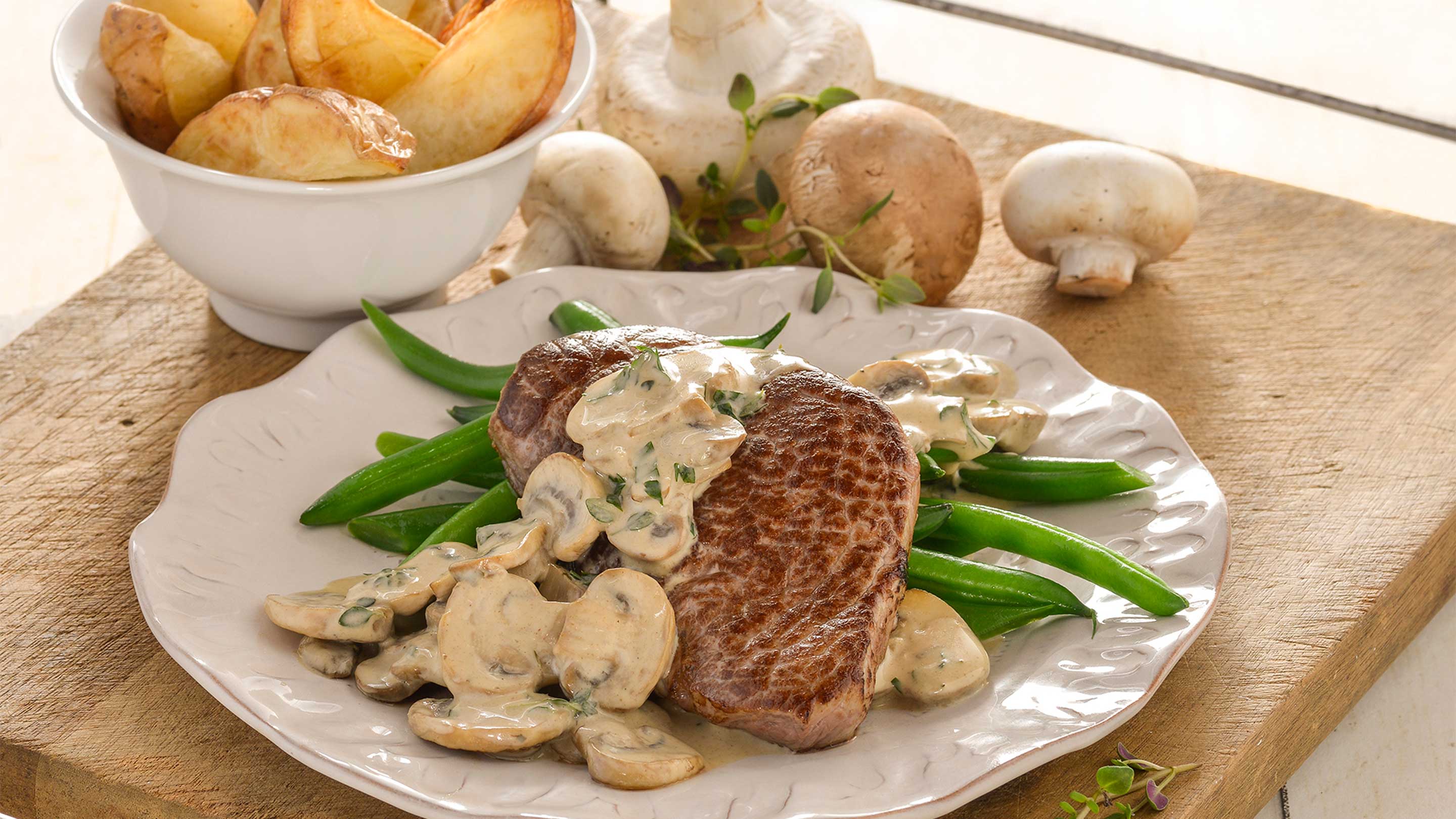 Steak with Creamy Mushroom & Herb Sauce Recipe