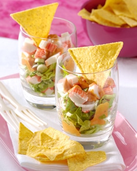 Krabsalade met groene sla en pittige gedroogde tomatensaus