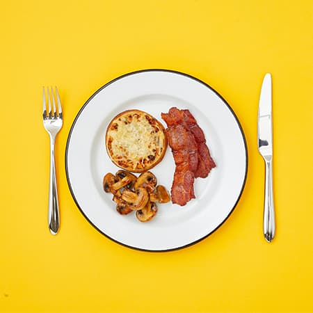 CHEESY MARMITE CRUMPETS WITH CRISPY BACON