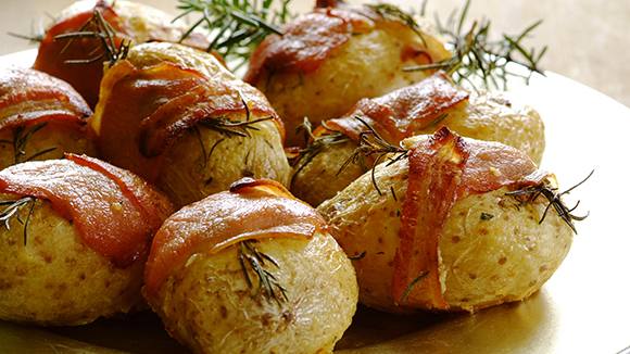 Bacon and rosemary wrapped roast potatoes