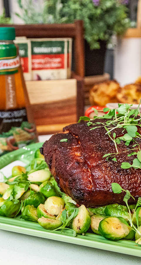 GLAZED GAMMON WITH BRUSSELS SPROUTS, RED WINE GRAVY AND APPLE SLAW
