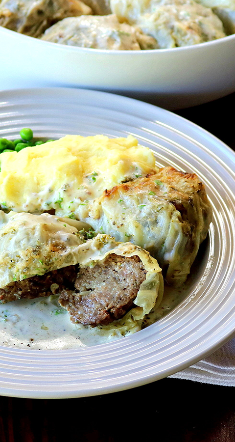 CABBAGE-WRAPPED MEATBALLS IN A CREAMY ONION SAUCE