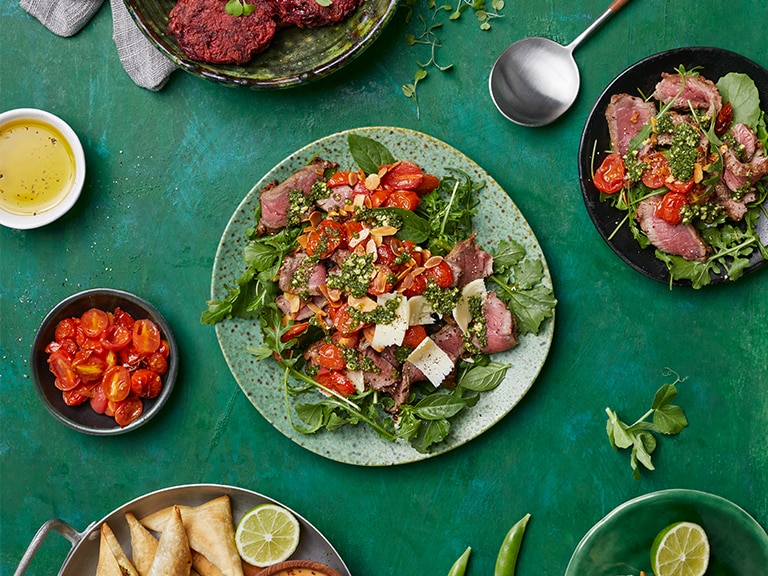 BEEF TAGLIATA SALAD WITH TOMATOES, ROCKET AND BASIL