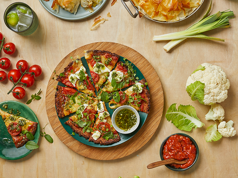 Cauliflower Pizza With Three Cheese Sauce