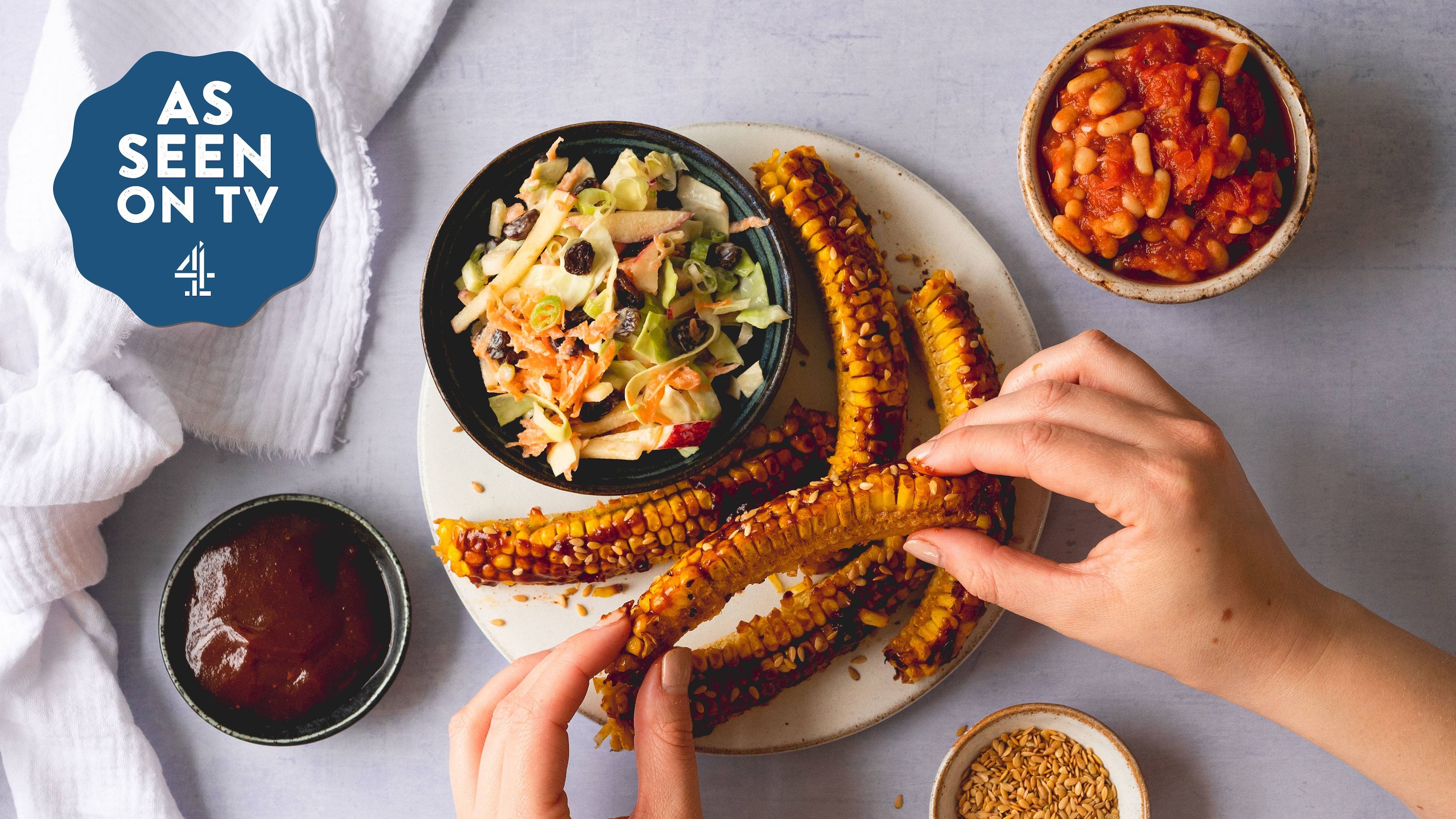 Corn ribs with vegan beans and apple ‘slaw