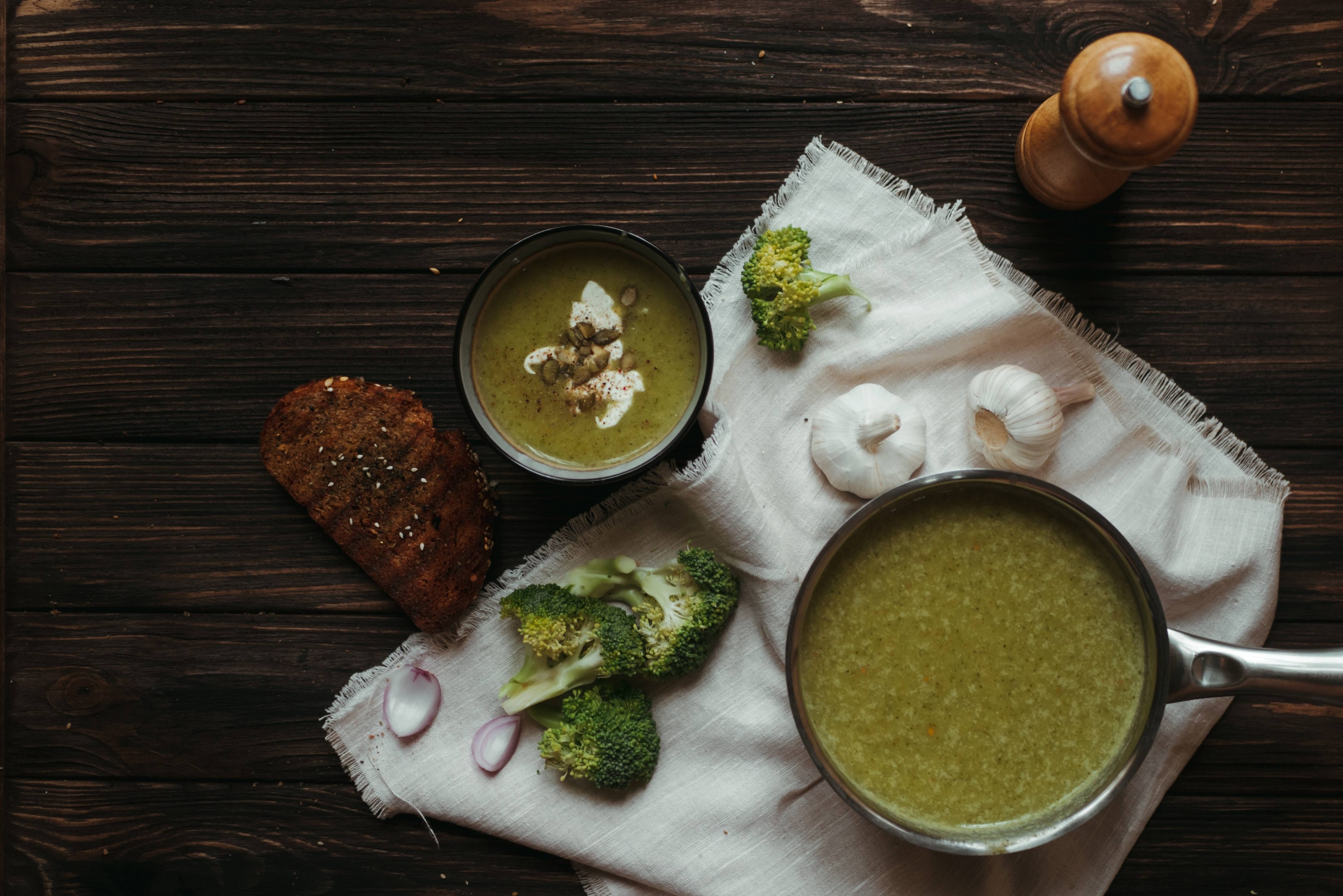 Broccoli cheddar soups in bowls