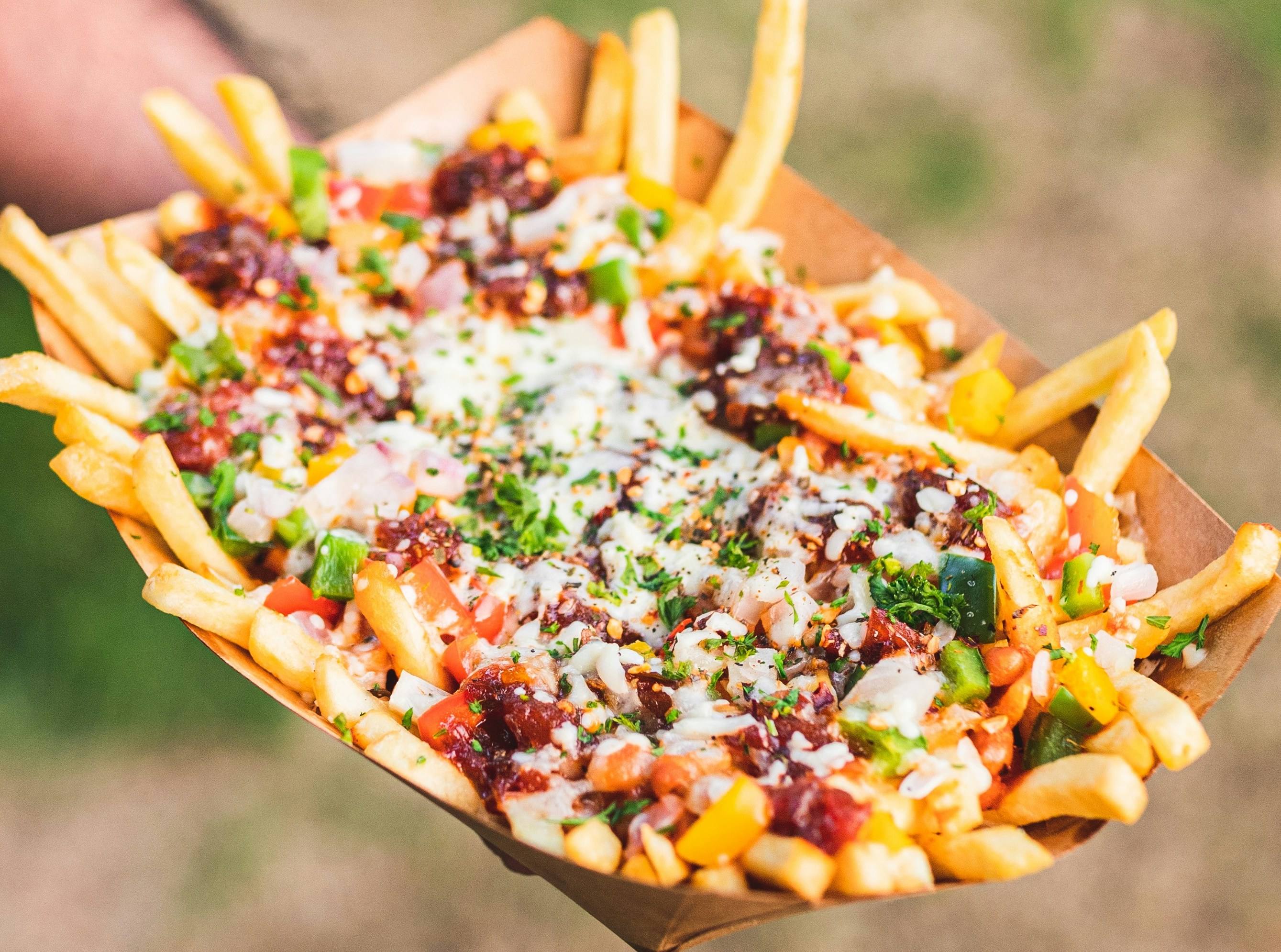 Photo of carne asada fries in a tray