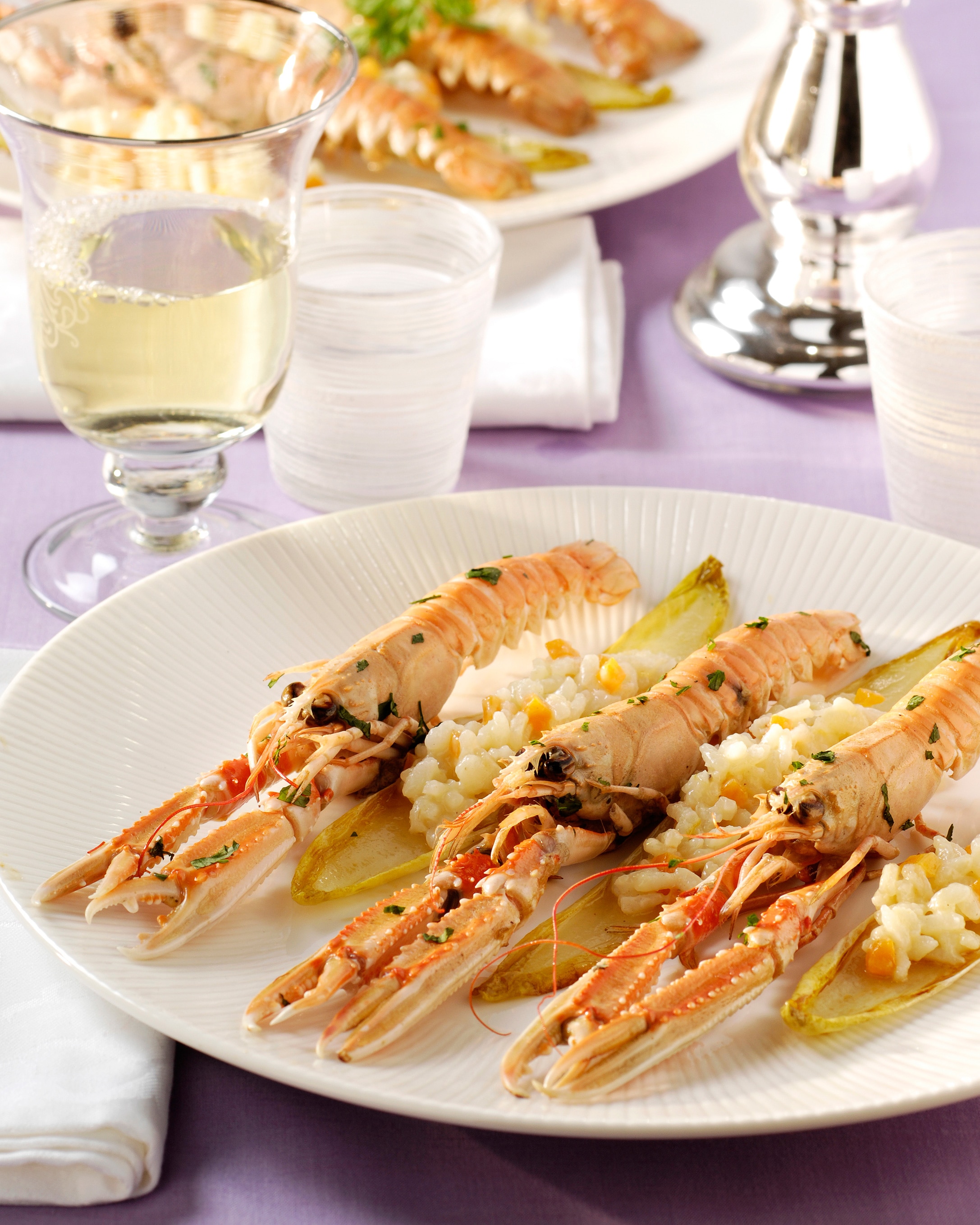 Langoustines au risotto et chicons caramélisés