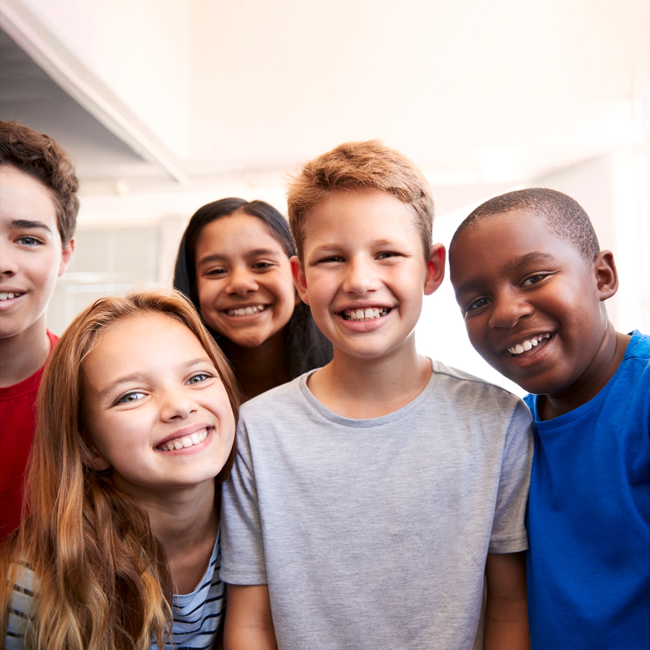 6 Children smiling forward
