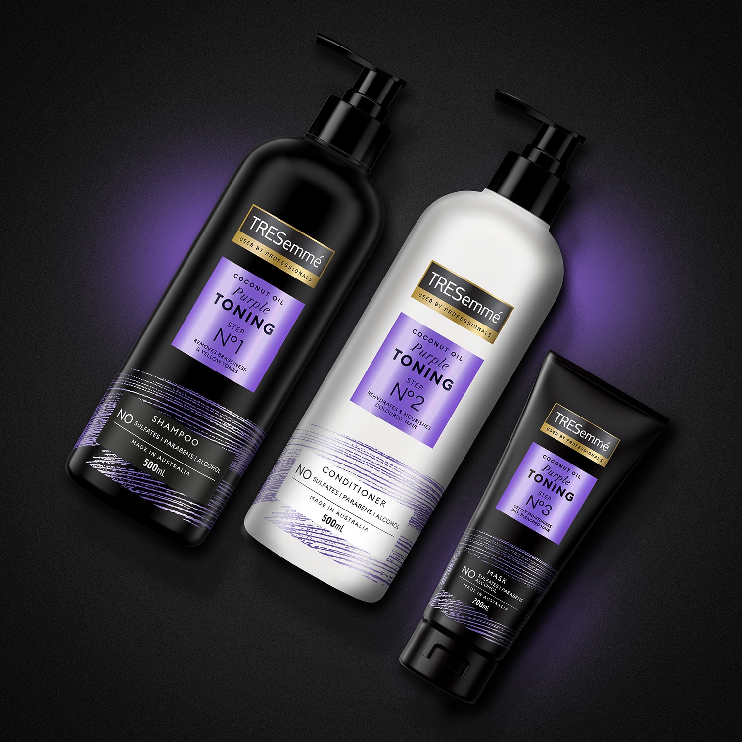 Product shot of TRESemmé Purple Toning shampoo, conditioner and mask