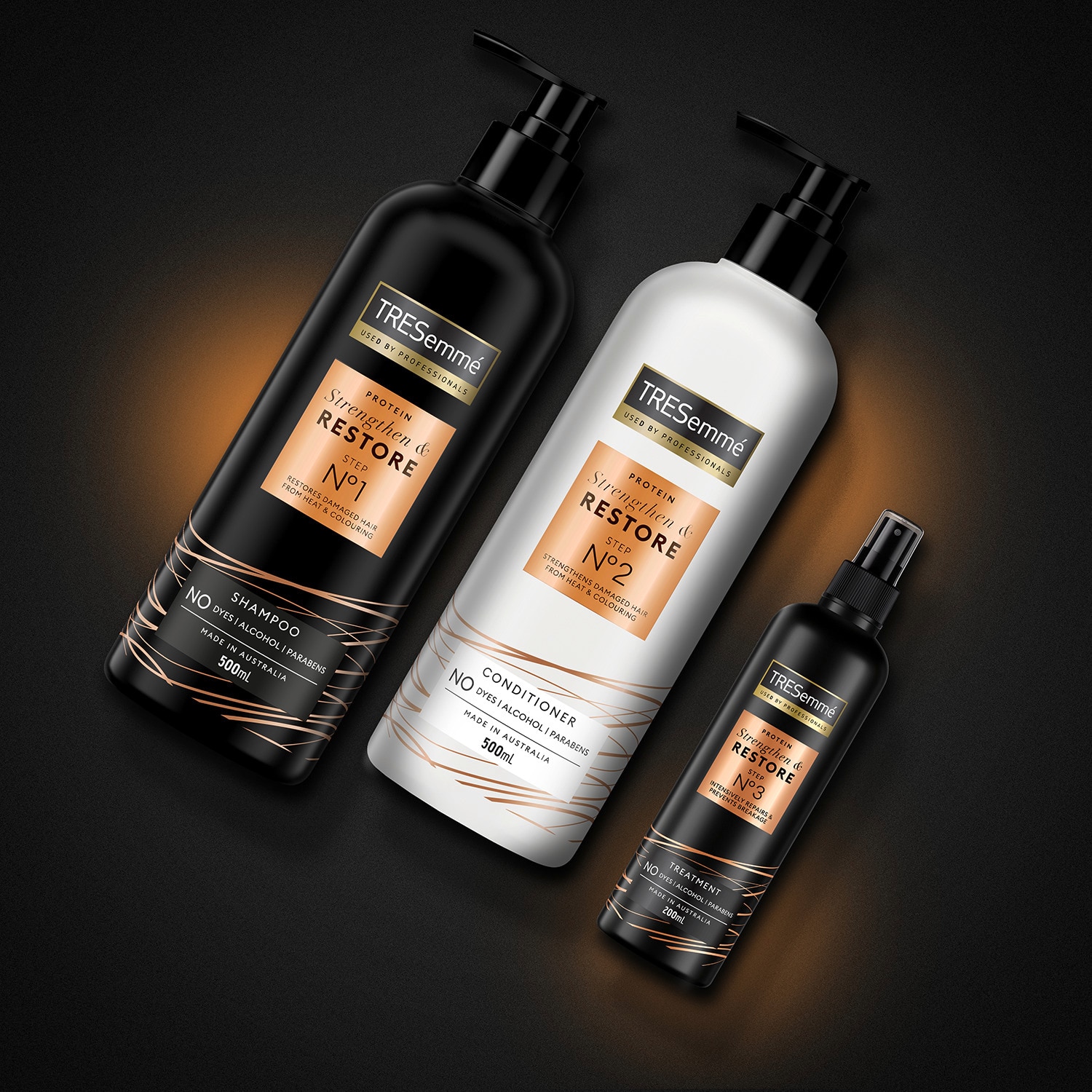 Product shot of TRESemmé Strengthen & Restore shampoo, conditioner, and treatment