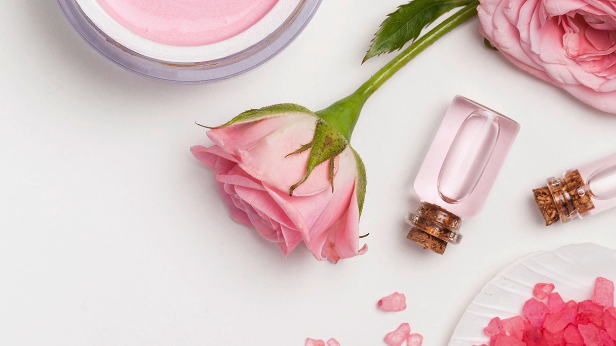 Pink rose, skin cream and perfume