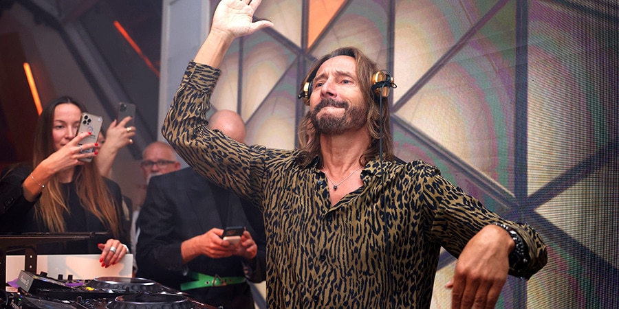 Bob Sinclar performing on stage at the Magnum Cannes party