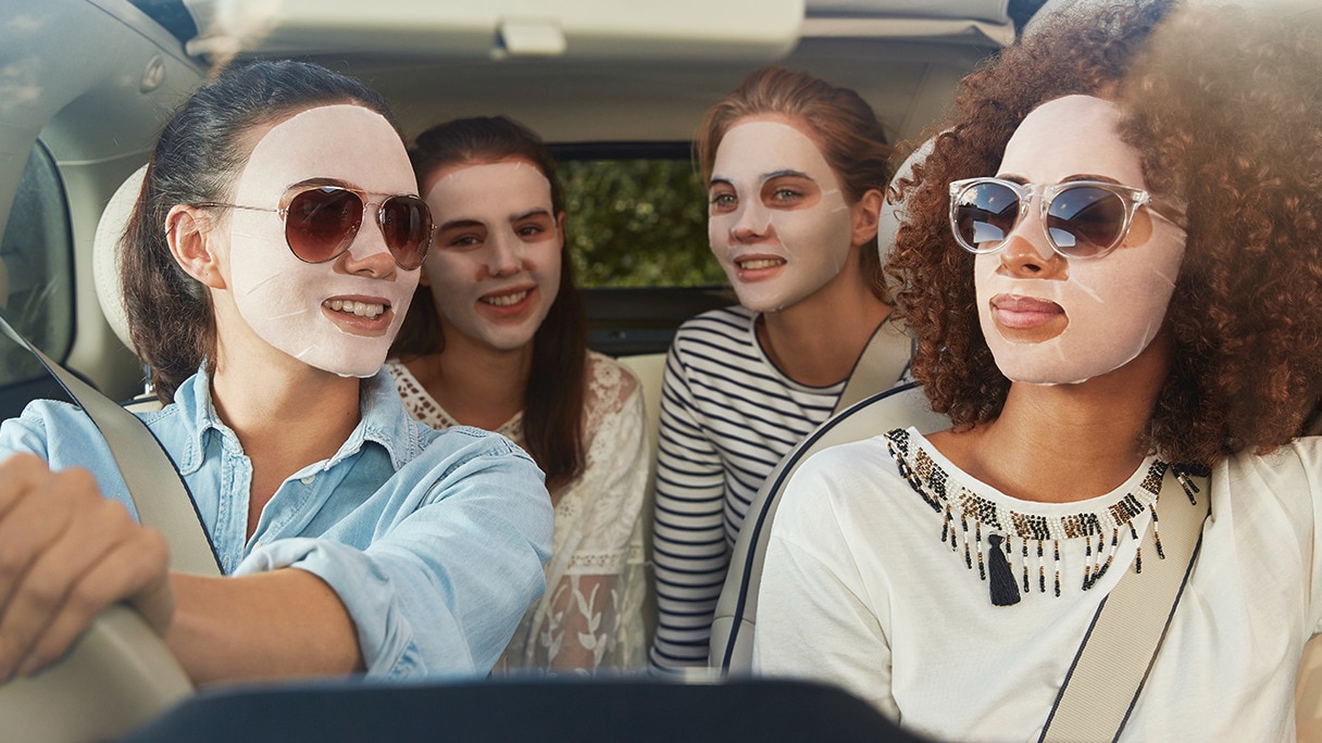Four girls in the car wearing Simple Sheet Masks