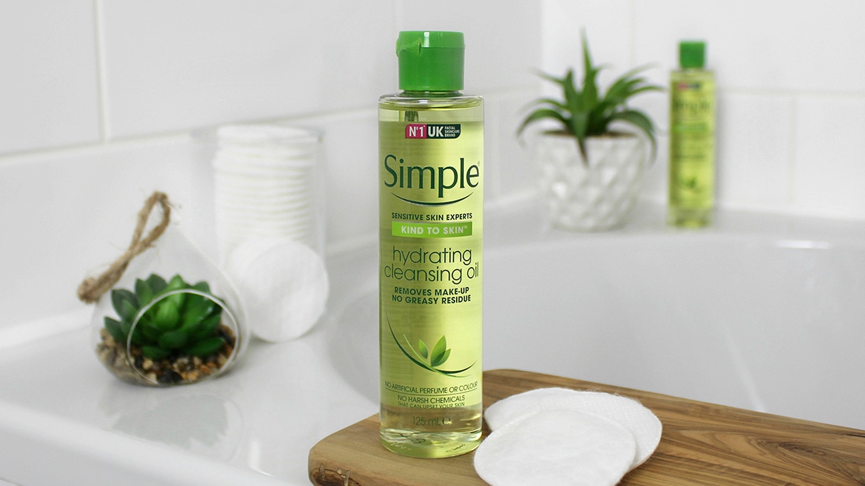 Styled shot of Simple Hydrating Cleansing Oil in a bathroom