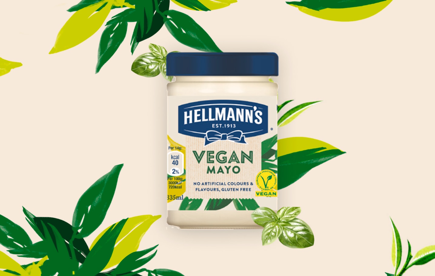 Vegan mayo jar with cream coloured background and leaves