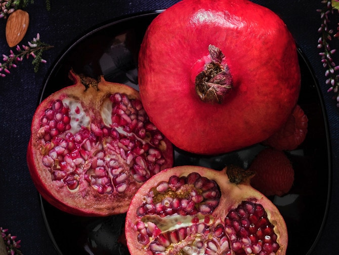 Several open pomegranates Text