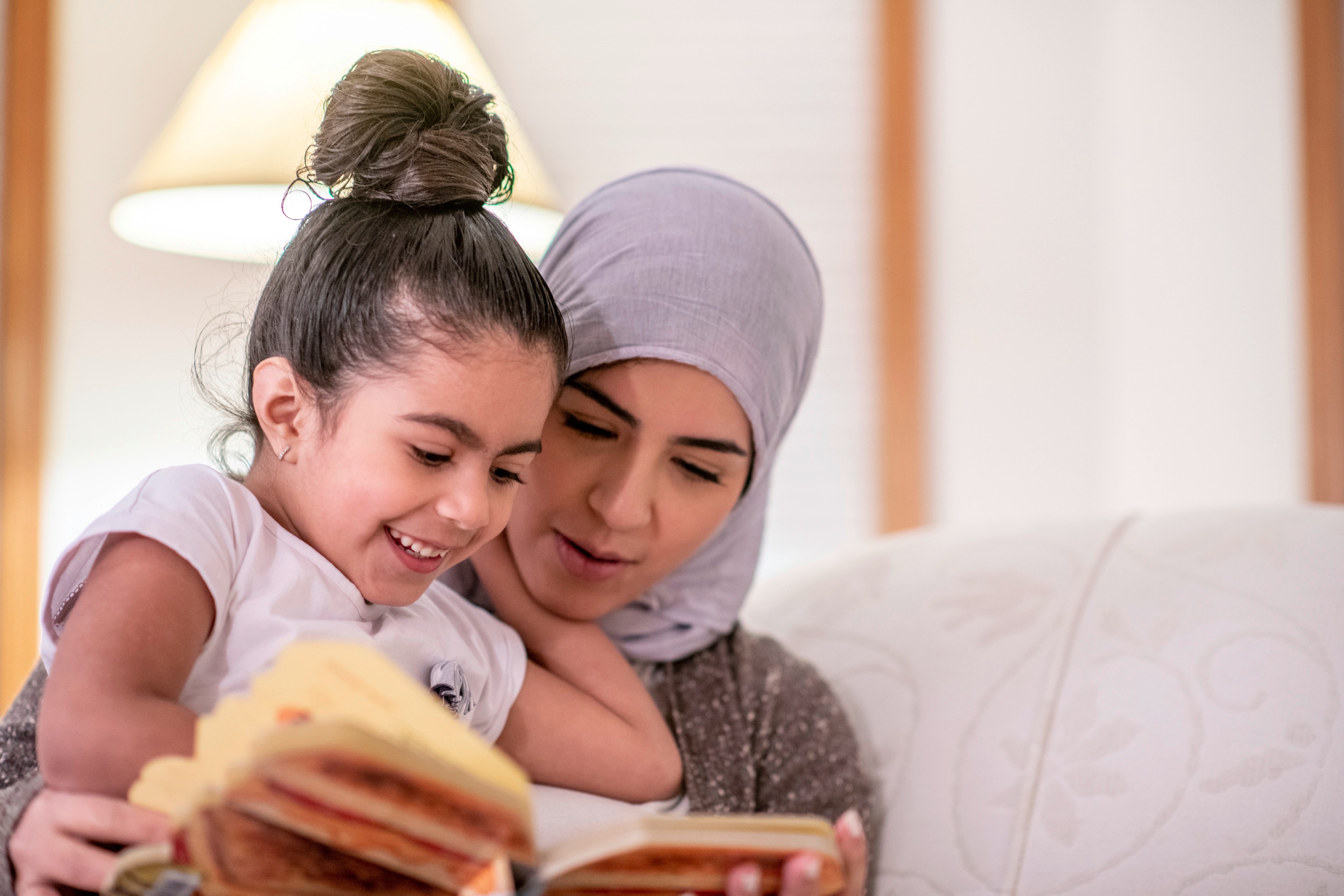 Mother and daughter reading