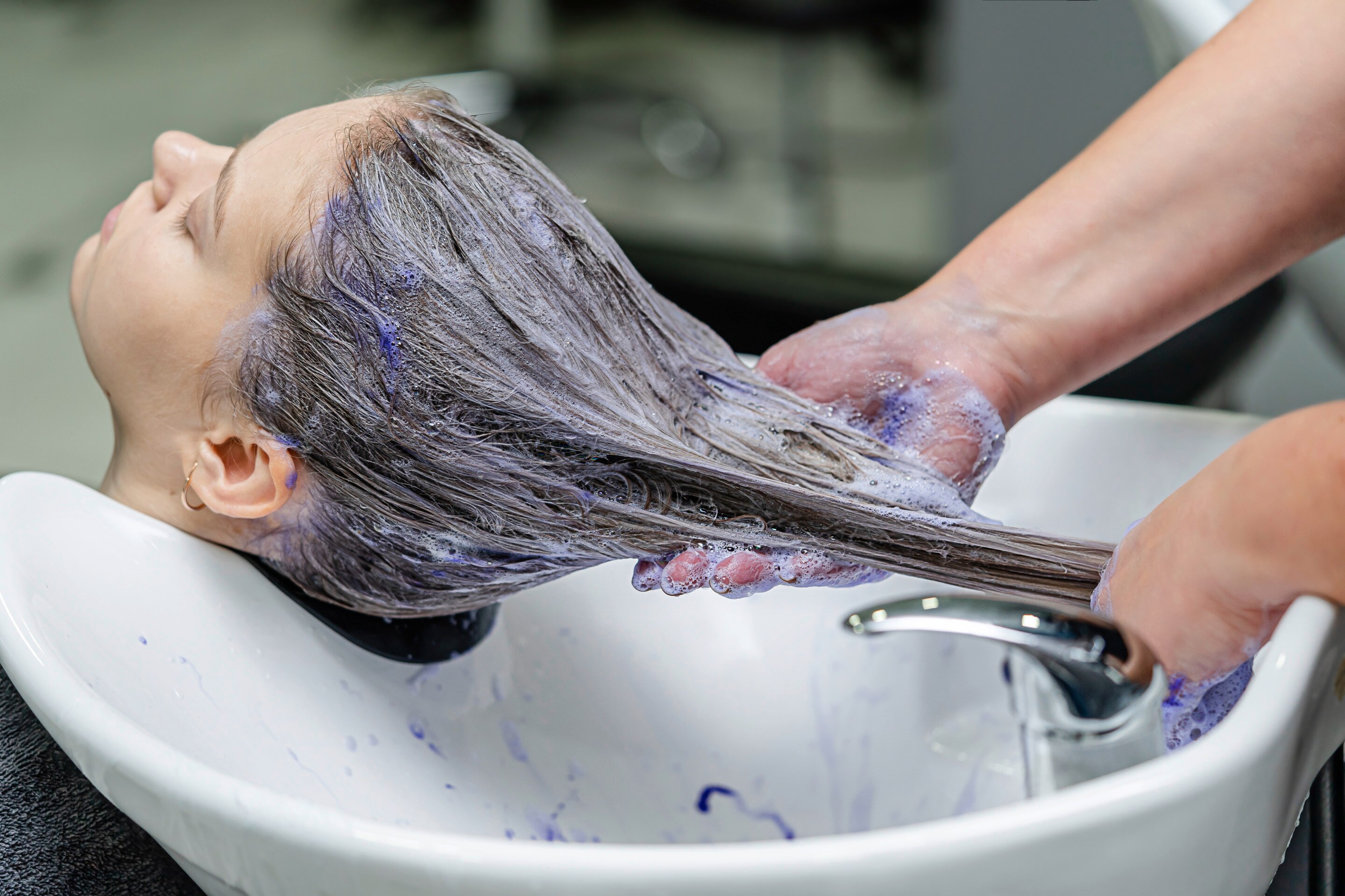 Toning hair with purple shampoo