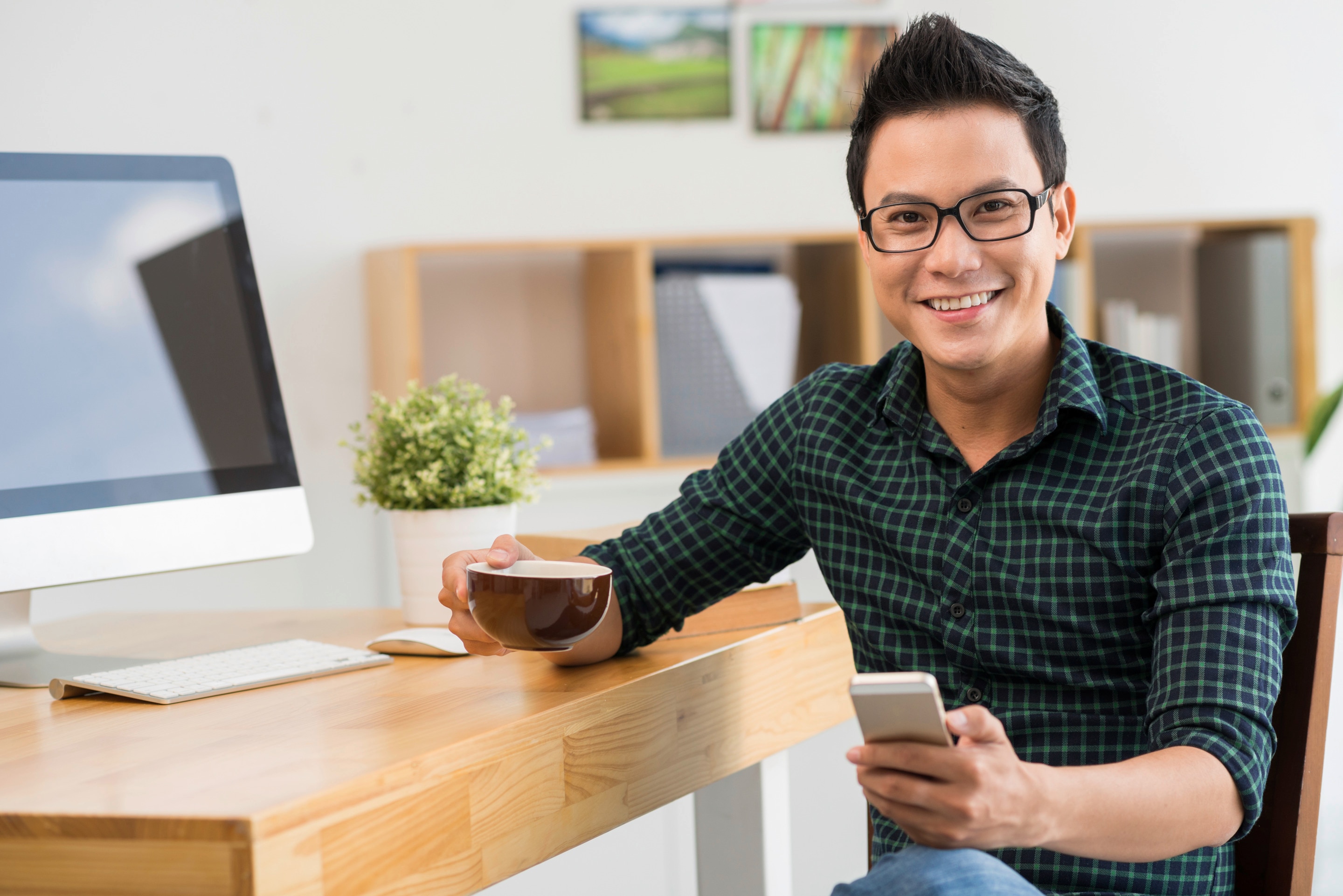 Asian man wearing glasses at the office