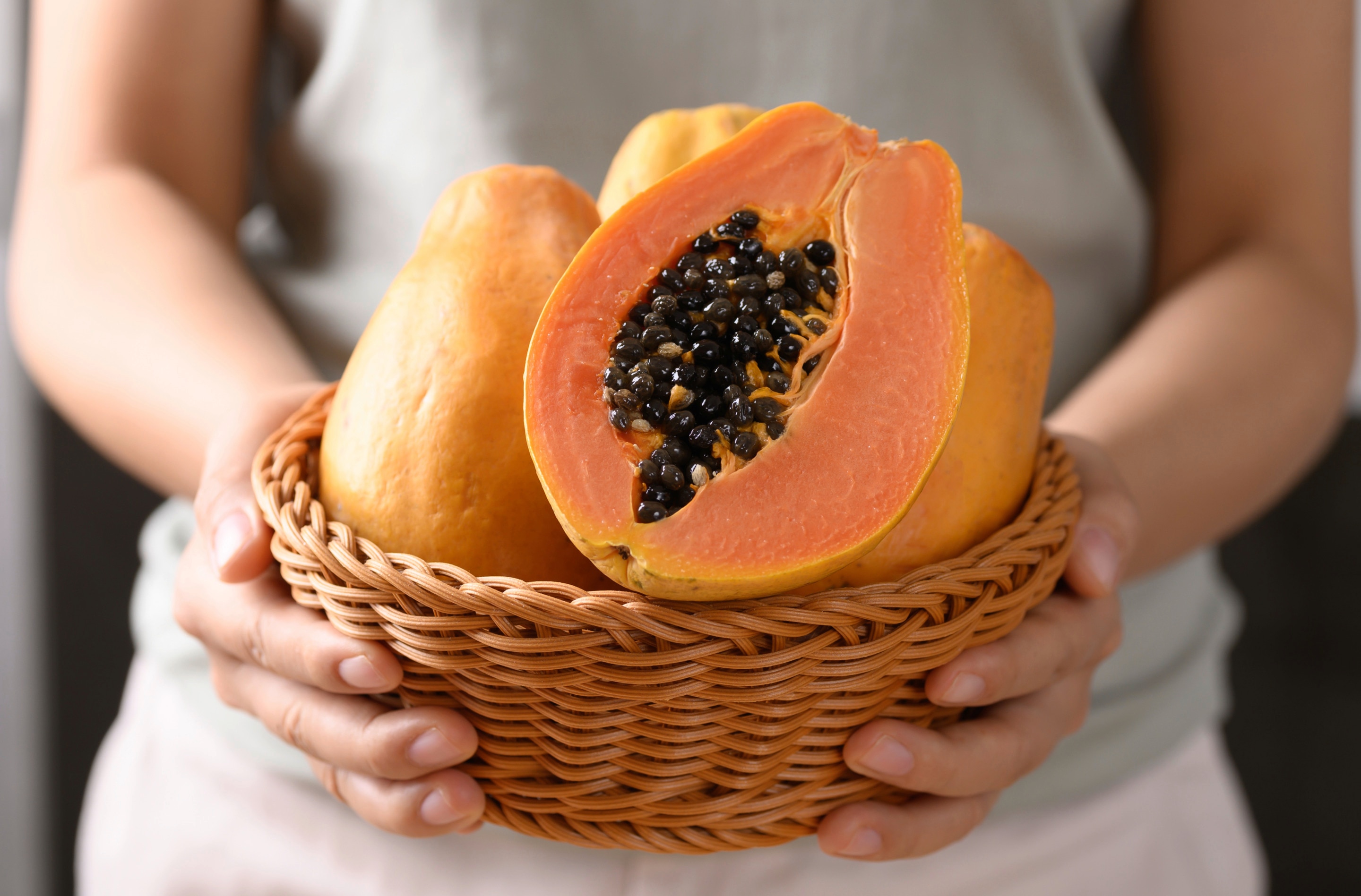 Ripe papaya fruit in basket