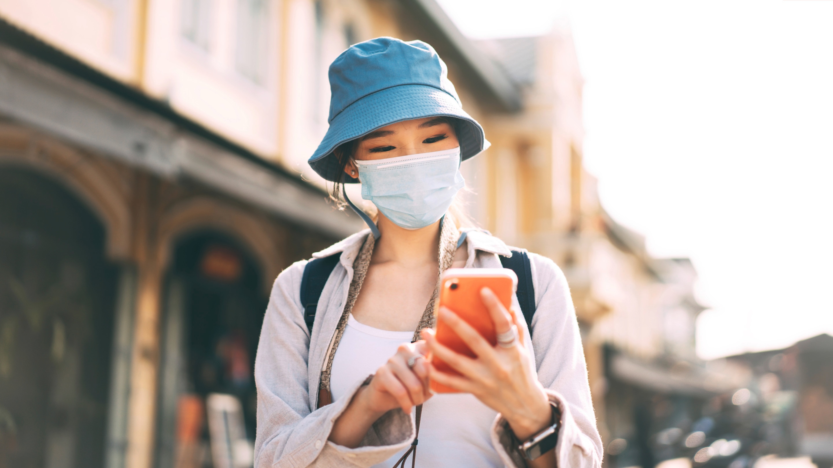 Young woman wearing a surgical mask
