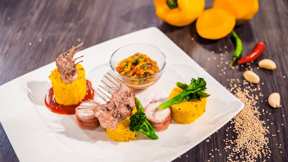Pistachio Crusted Rabbit with Herb Polenta, Raw Mango Salsa and Cranberry image