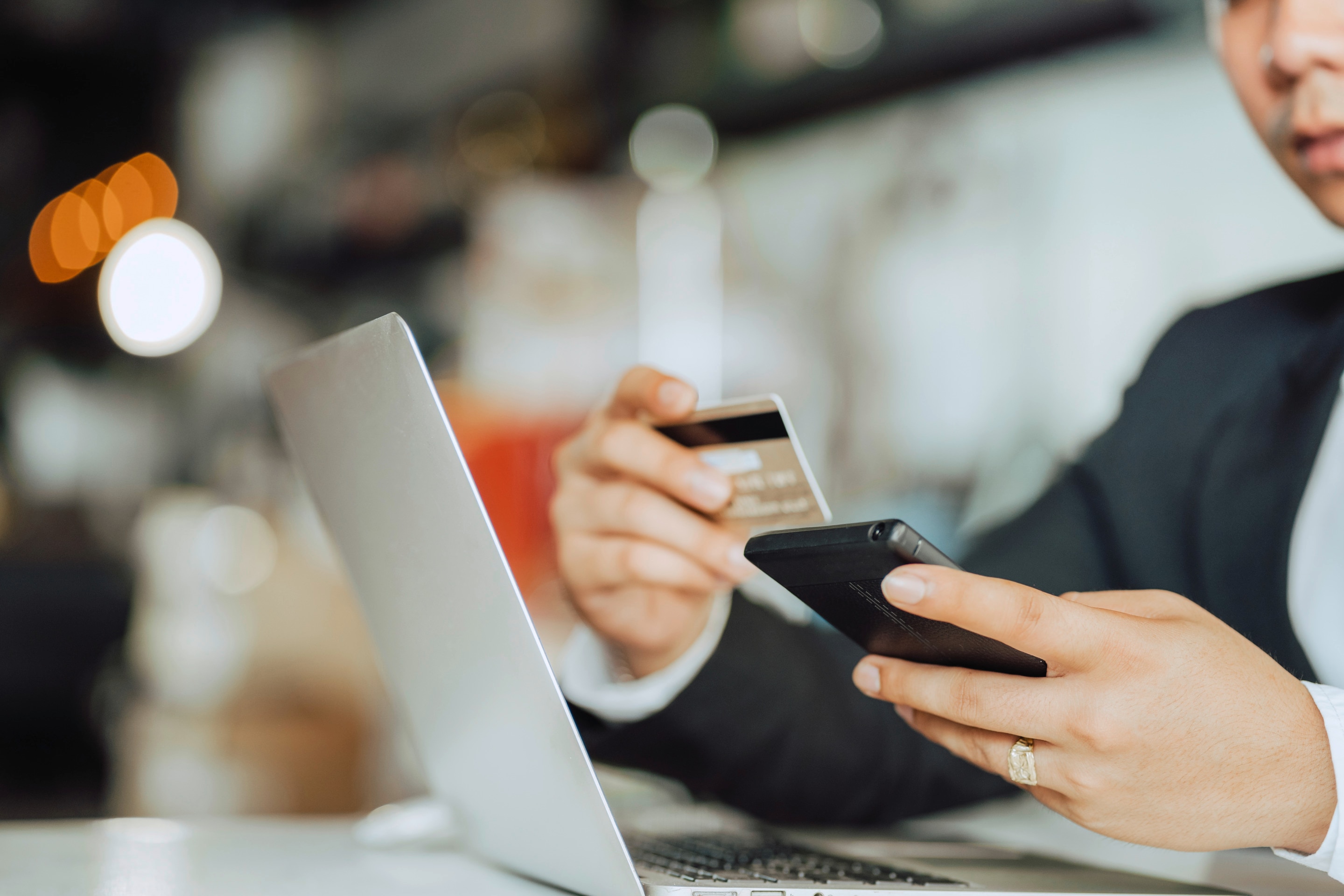 Asian businessman holding credit card