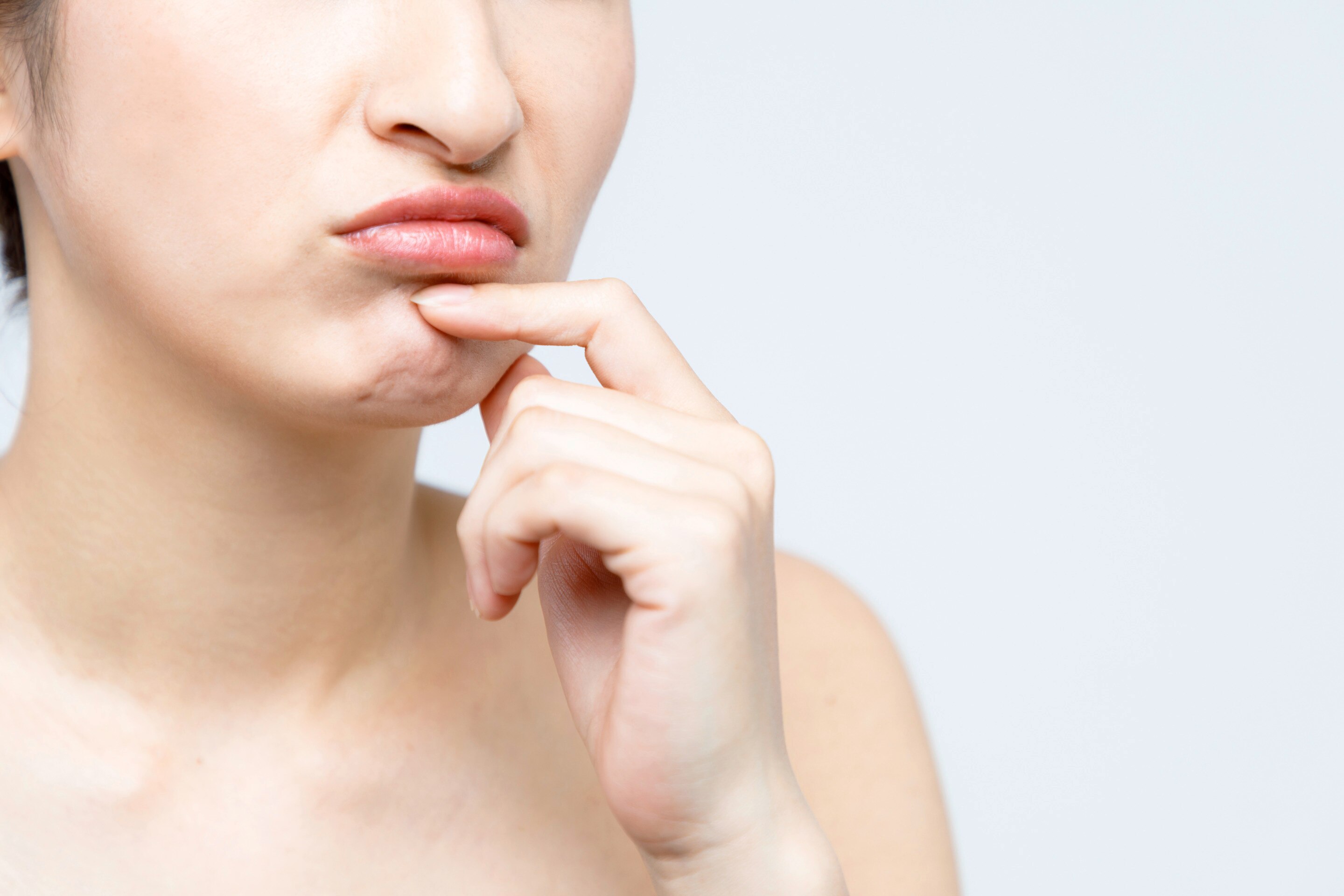 Woman appears to be thinking