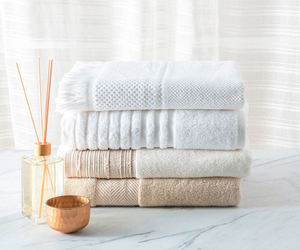 A stack of pristine, fluffy towels.