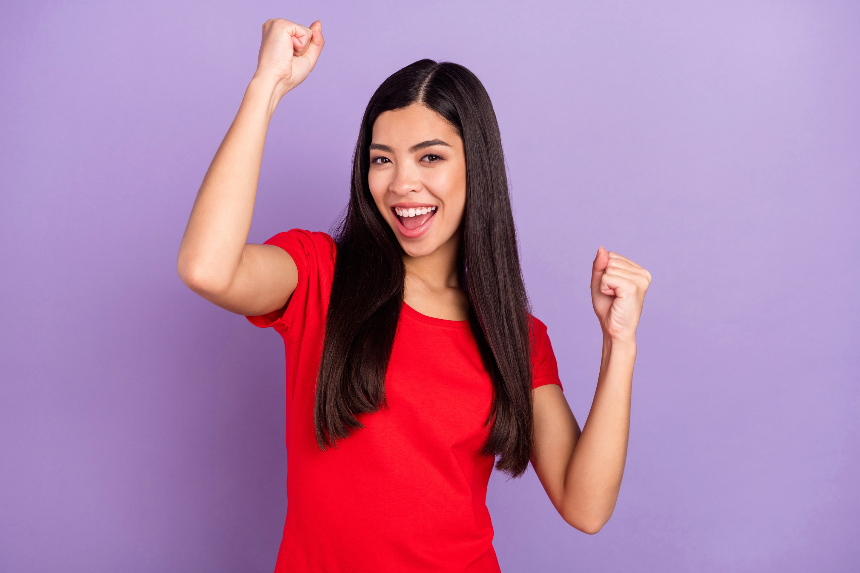 Woman with long hair in red shirt