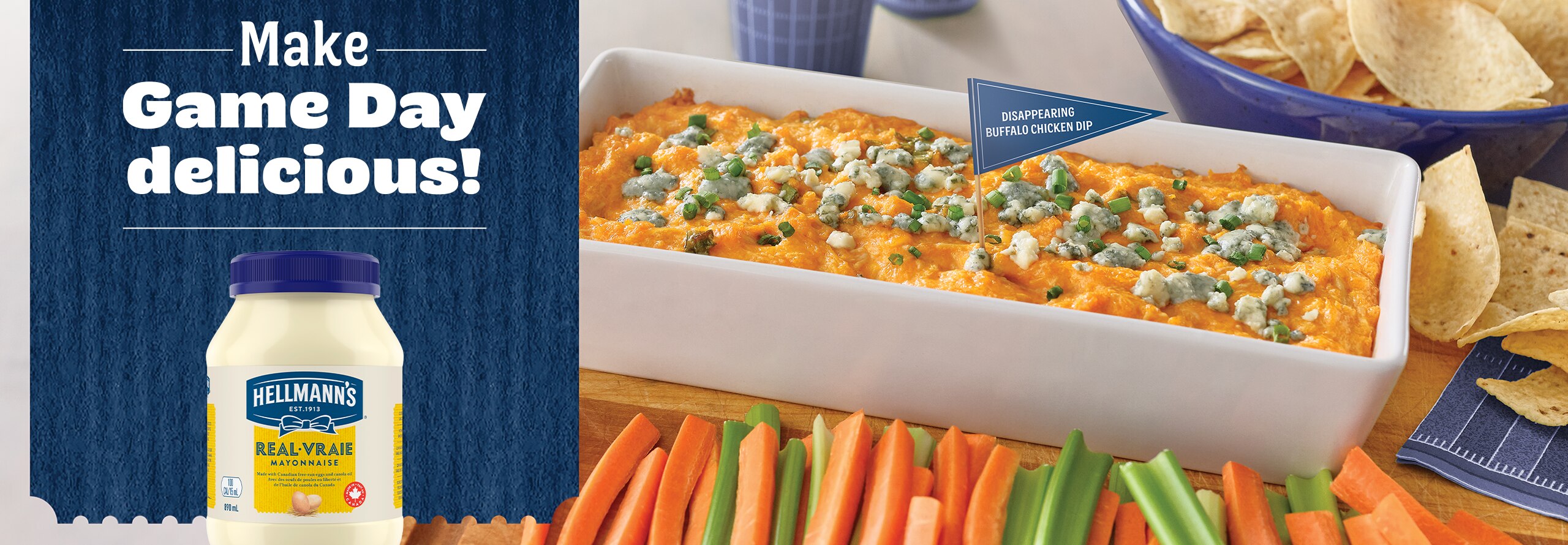 An image showing a dish of Hellmann's Disappearing Buffalo Chicken Dip surrounded by vegetables and chips, alongside the text "Make Game Day delicious!" with a jar of Hellmann's Real Mayonnaise 890mL right below.