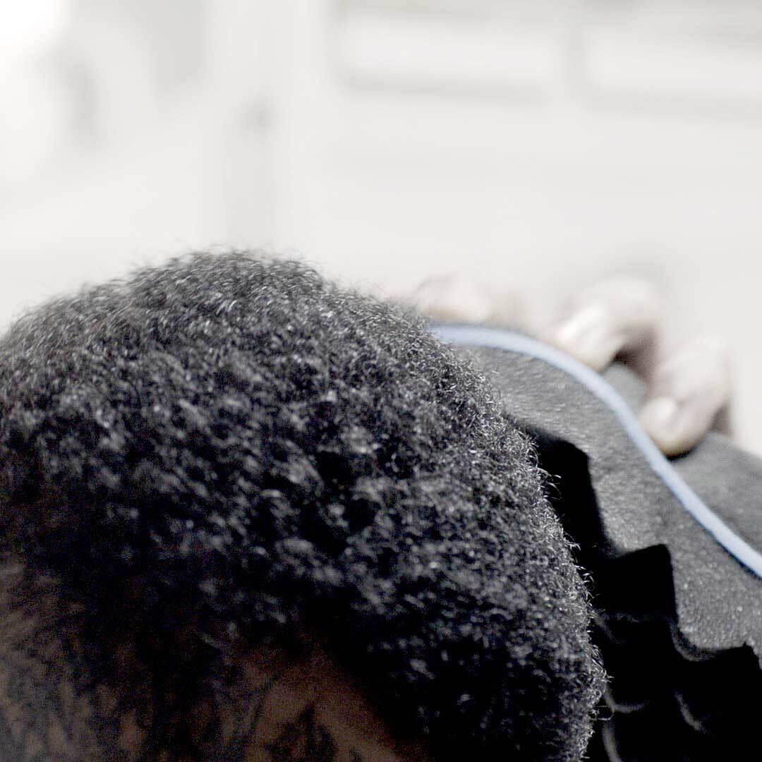 A guy with a crew cut.