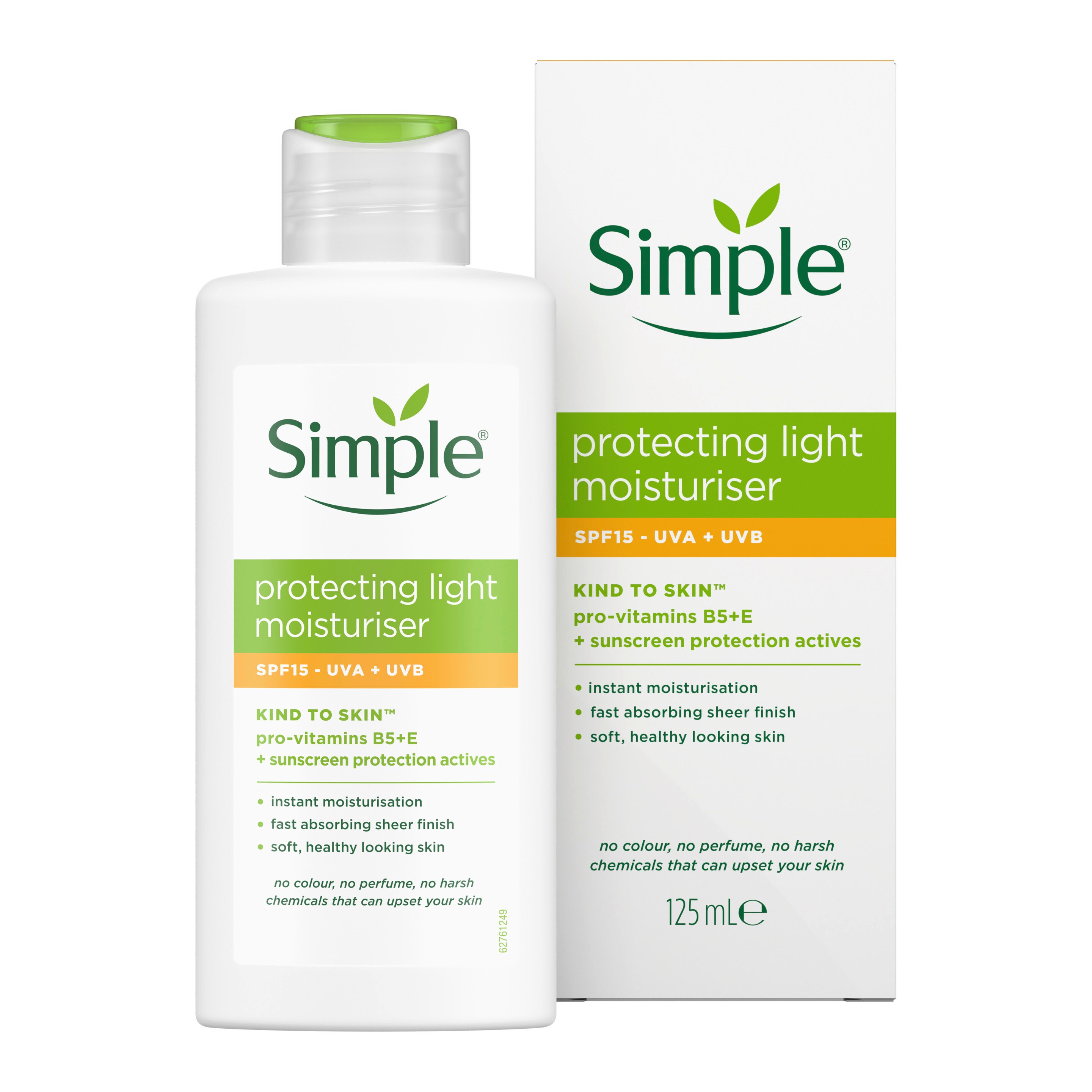 Hand holding a tube of Simple facial wash in a bathroom setting 