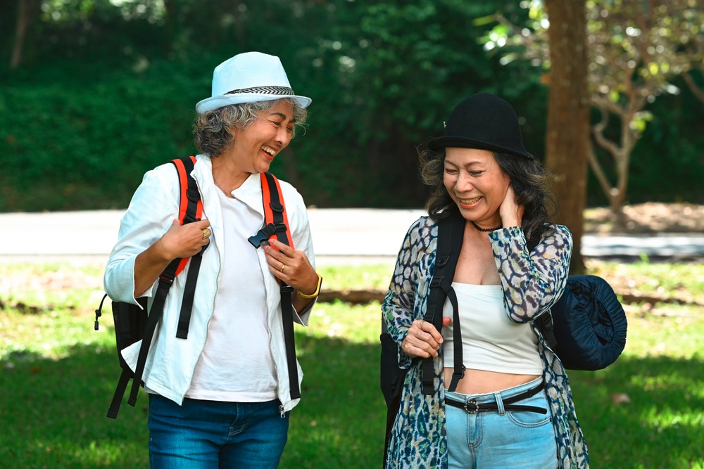 Two senior women traveling together.