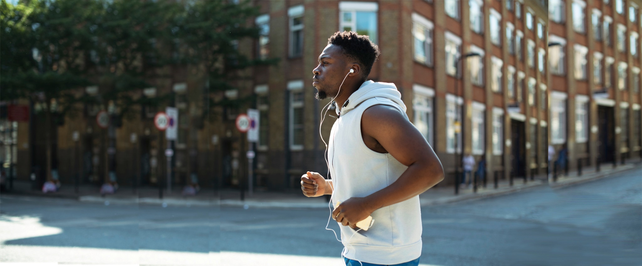 Young man in yellow shirt sweating