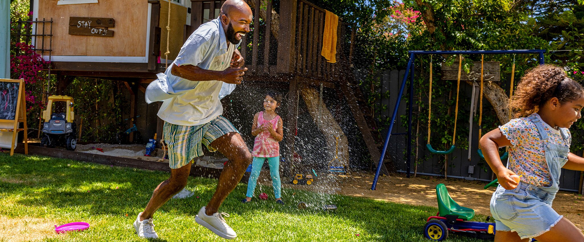 A family playing confidently outside because their hygiene soap prevents the spread of germs.