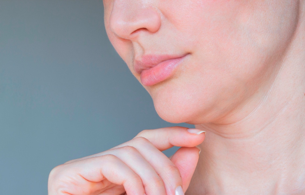 A portrait of woman and her neck lines.
