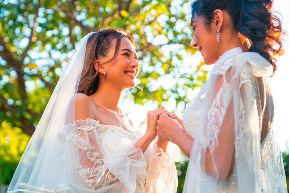 A portrait of lesbian couple at their wedding.