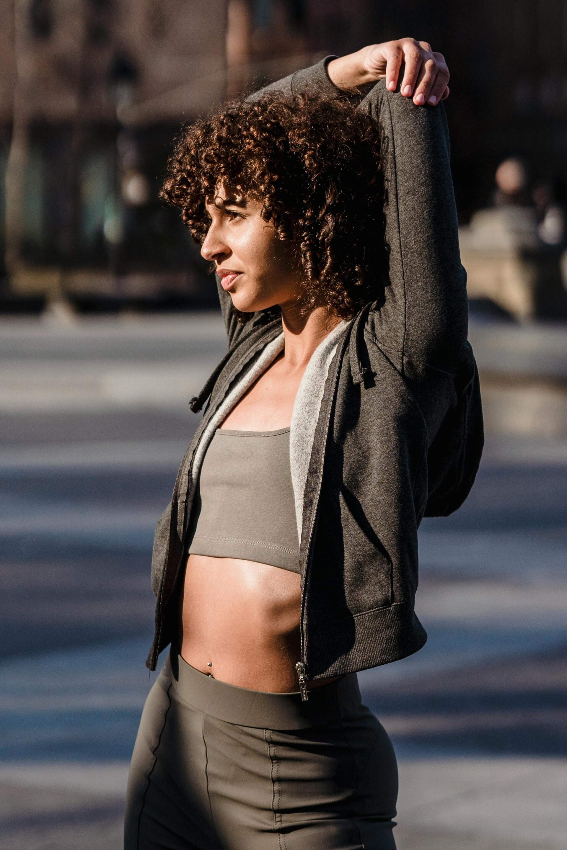 Woman stretching outdoors in the sun