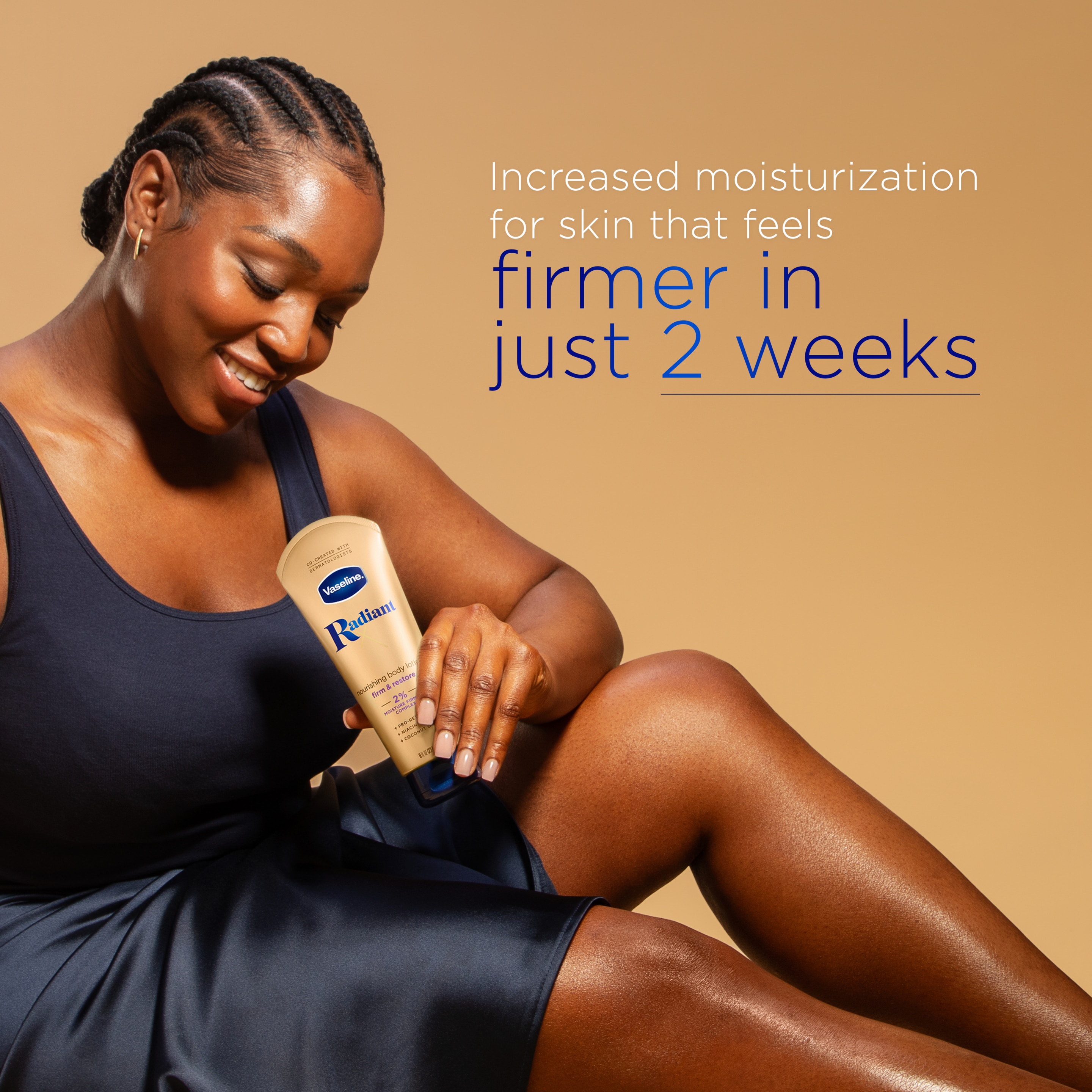Woman applying Vaseline® Radiant X irm & Restore  Body Lotion on her legs