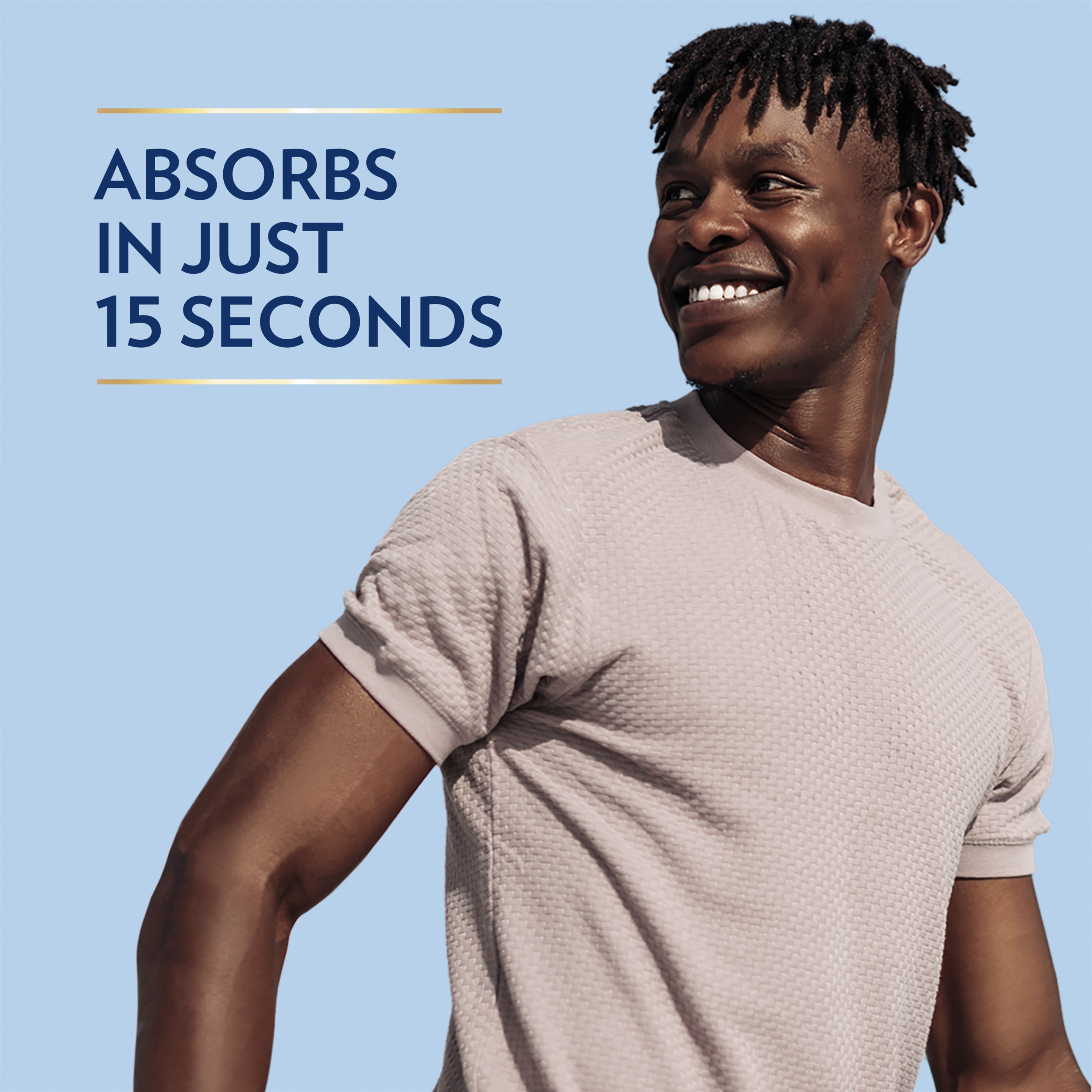 man applying lotion on his arm