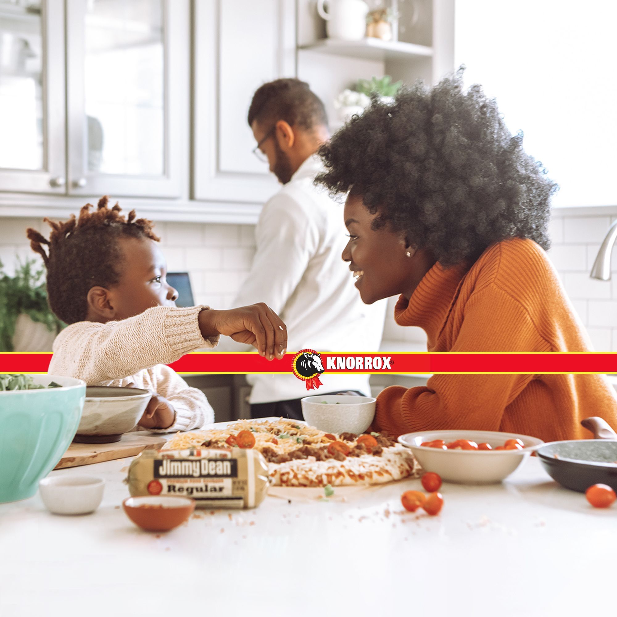 Boy at the table with his mother