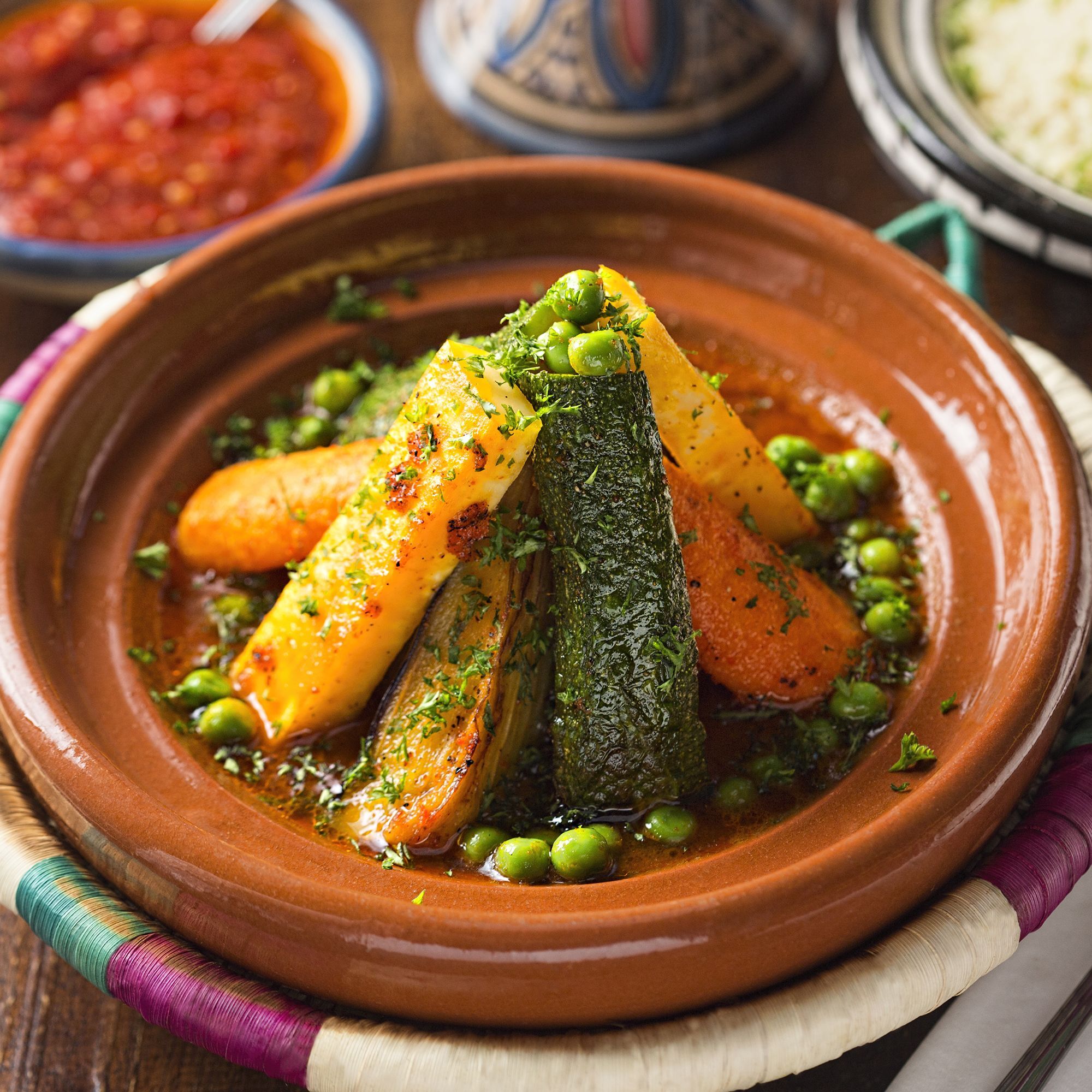 Vegetable tajine with rice and tomato sauce