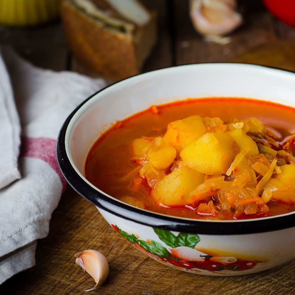 Bowl of soup with potatoes