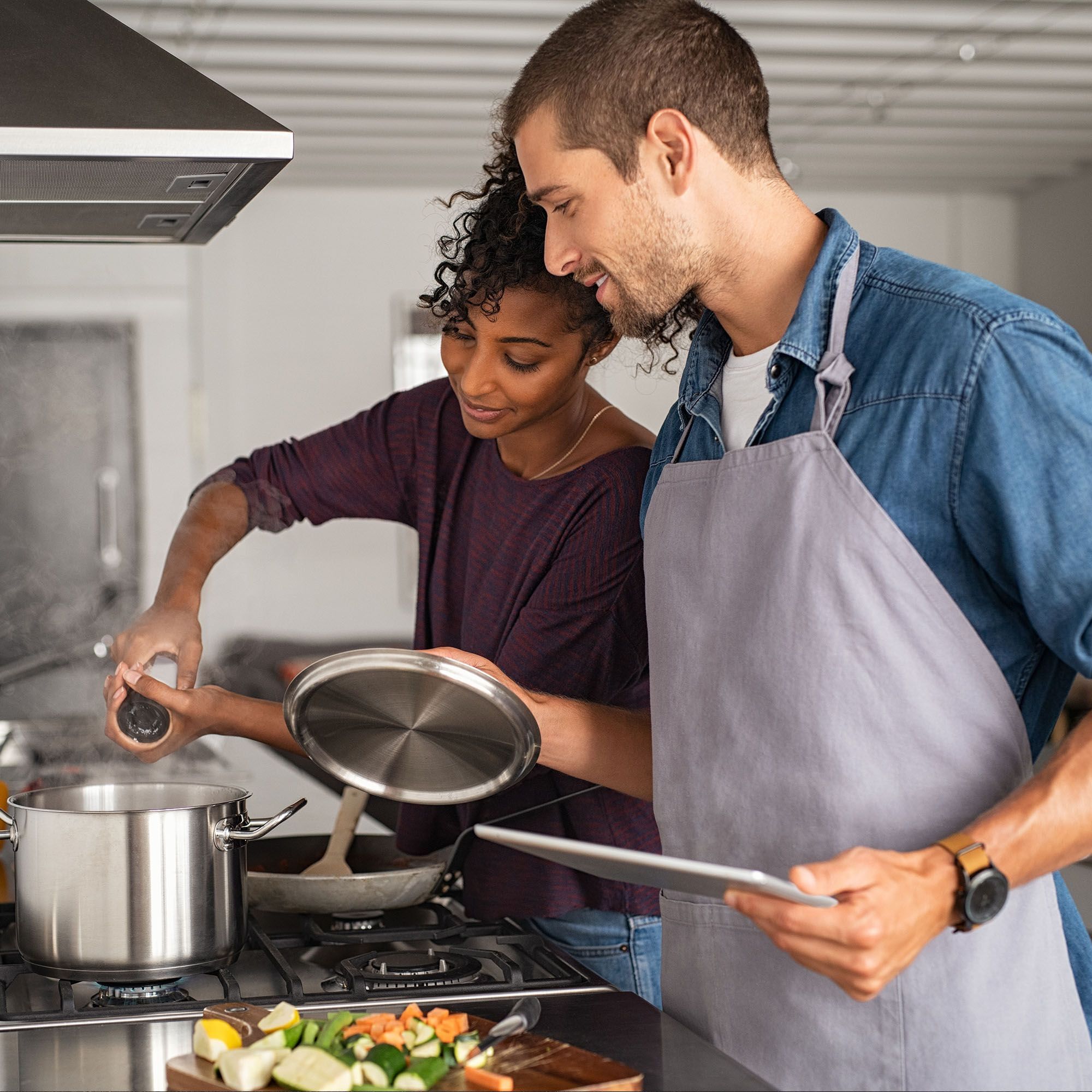 Couple cooking in a kitchen together