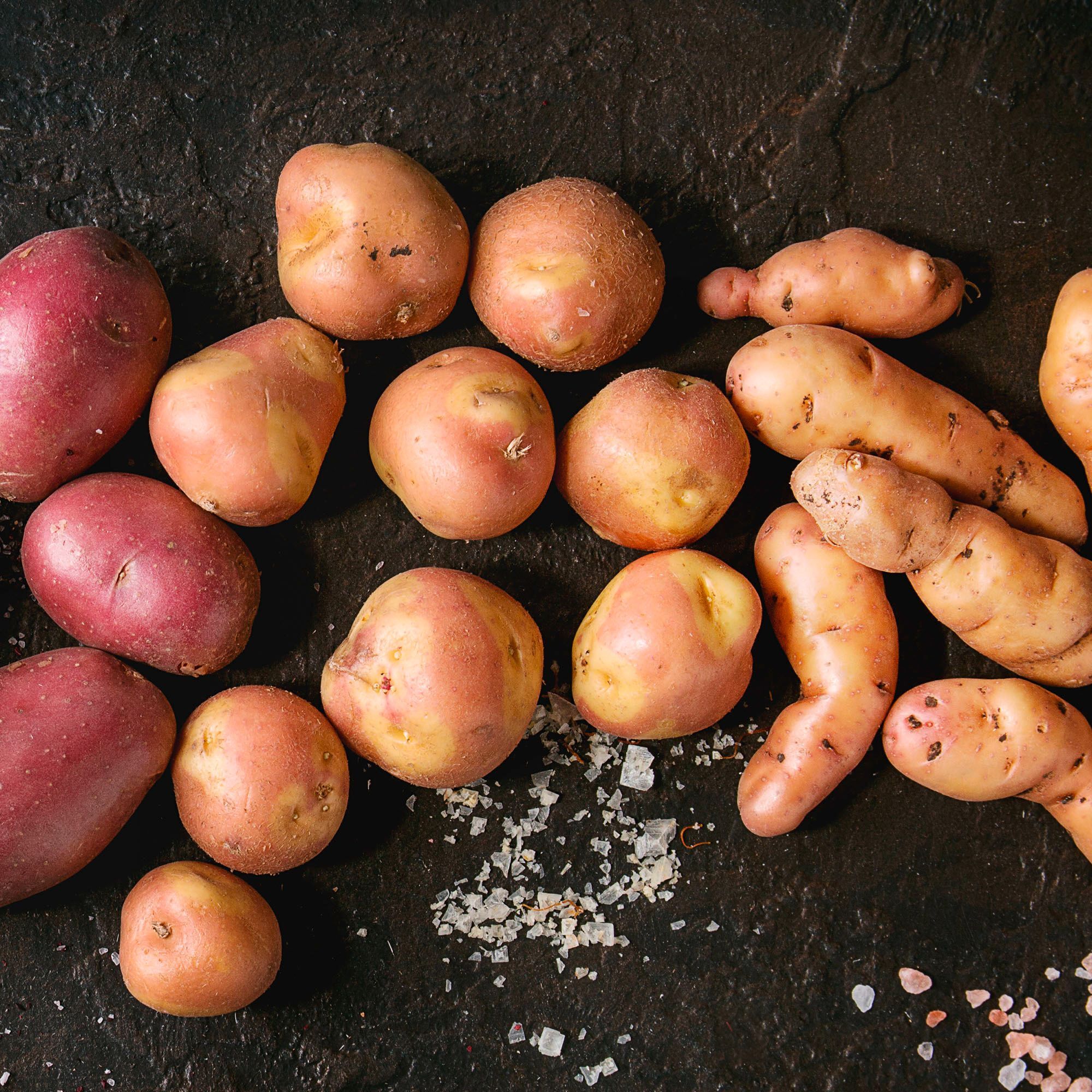 Variety of raw uncooked organic potatoes